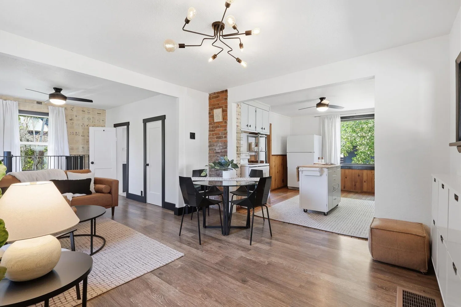 Open concept living and dining area with natural light